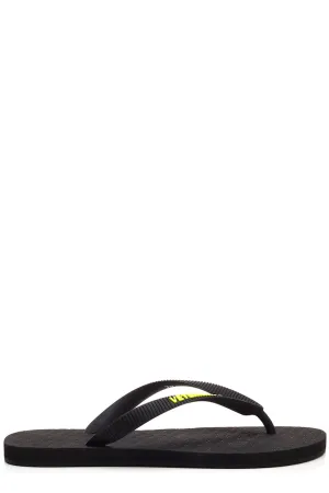 Vetements Logo Embossed Flip Flops